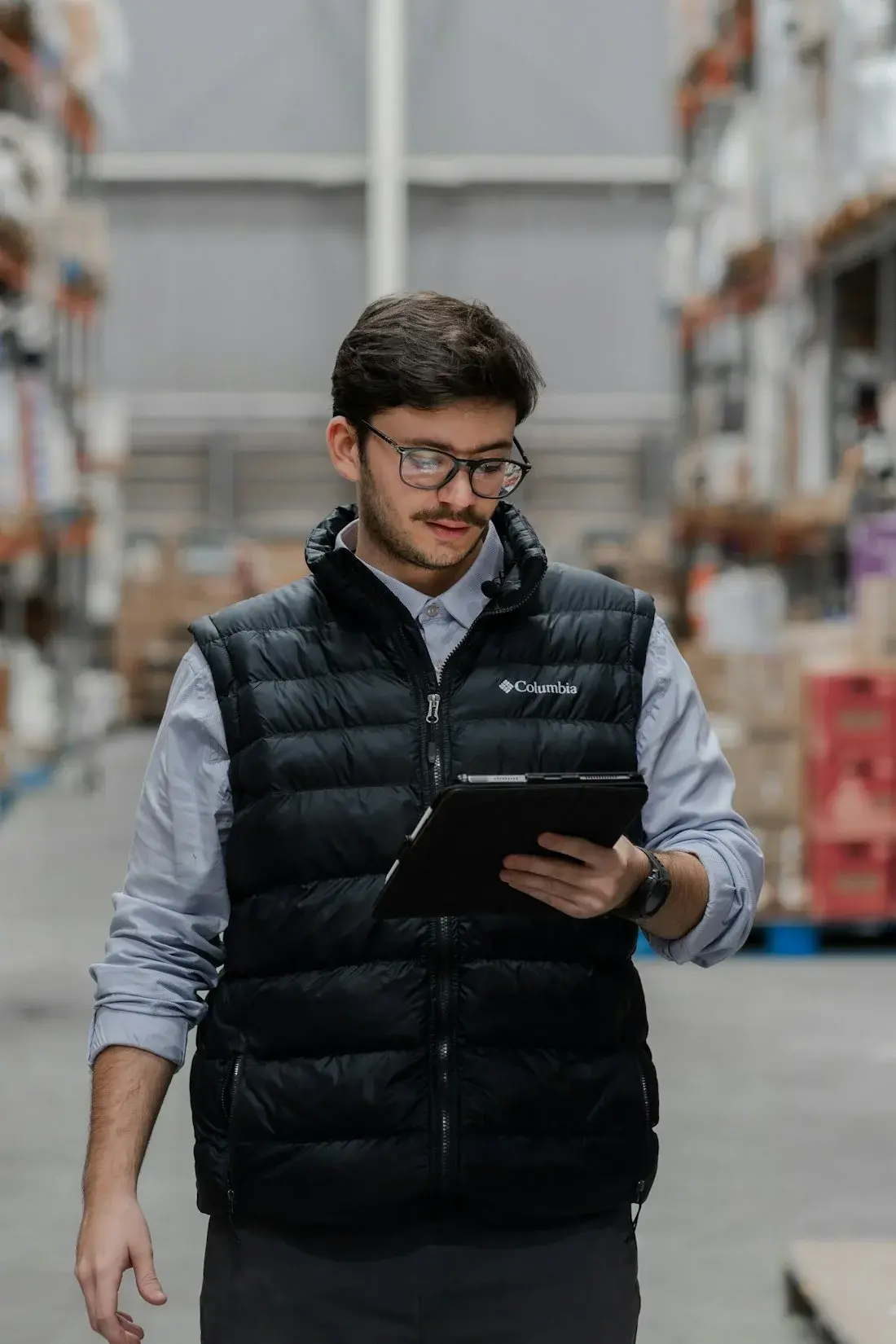 Warehouse worker holding a tablet
